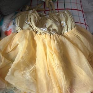 Adorable baby dress dark yellow color with cute flowers on the top. 9-12mon